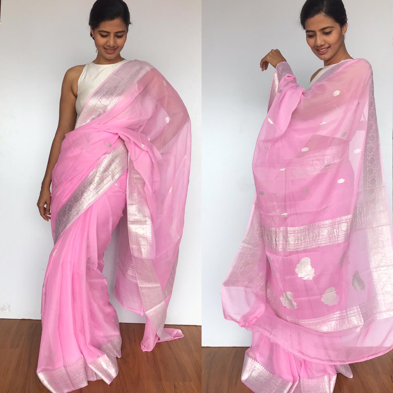 Baby Pink Coloured Kanchipuram Silk Saree with Silver Zari Pallu.