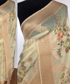 Cream Linen Silk Saree with Beautiful Prints along with Antique Zari Border