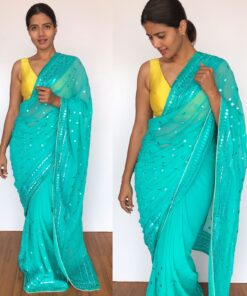 Turquoise Georgette Saree with Mirror Work and highlighted with Gota Work Border