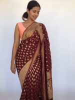 Maroon Banarasi Georgette Saree adorned with Antique Zari Motifs