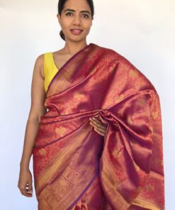 Red Banarasi Silk Saree with Purple tone adorned with Peacock Motifs