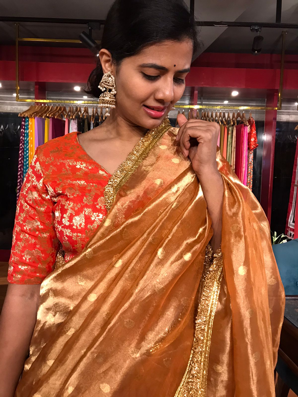 Orange Tissue Silk Saree woven with Beautiful Gold Zari Buttis - Mirra  Clothing