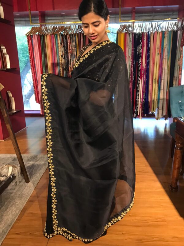 Organza saree by Mirra clothing.