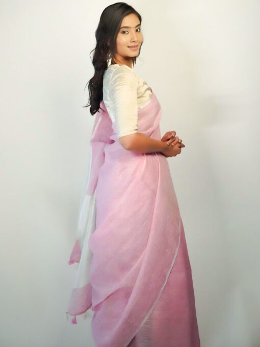 Pastel shade linen saree by Mirra clothing.