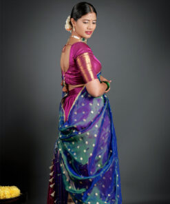 Side view of a model showcasing Magenta Silk Half Saree Set with Tissue Silk Dupatta , Suitable for special ceremonies by Mirra Clothing