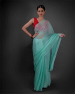 Front view of a model showcasing a Mint Blue Chiffon Saree With Badla Work, Perfect for brunch or lunch events by Mirra Clothing