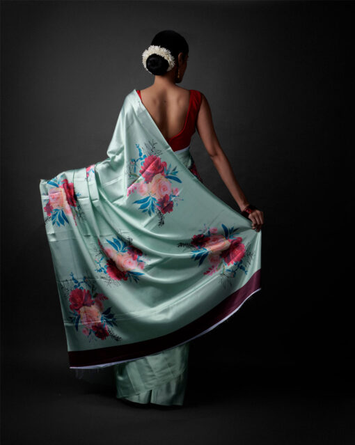 Back view of a model showcasing Sea Green Printed Satin Saree , Easygoing saree for shopping trips by Mirra Clothing