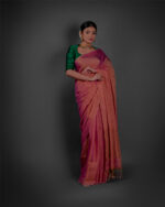 Front view of a model showcasing a Ombre Pink Tissue Linen Saree , Suitable for occasions By Mirra Clothing