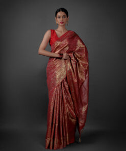 Full view of a model showcasing Red Banarasi Silk Saree with Gold Zari Weaves , Suitable For Wedding By Mirra Clothing