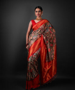 Full view of a model showcasing Green Banarasi Silk Saree Highlighted with Kalamkari Prints , Ideal for celebrations like Durga Puja or Navratri By Mirra Clothing