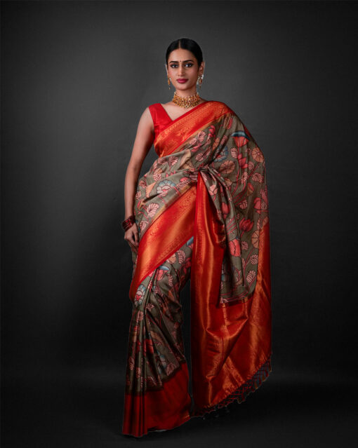 Full view of a model showcasing Green Banarasi Silk Saree Highlighted with Kalamkari Prints , Ideal for celebrations like Durga Puja or Navratri By Mirra Clothing