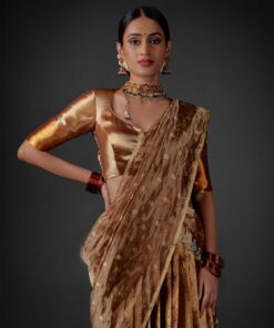 Front view of a model showcasing a Molten Gold Tissue Silk Half Saree Set with Dupatta and Blouse, Suitable for cultural festivities By Mirra Clothing