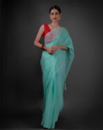 Full view of a model showcasing Mint Blue Chiffon Saree With Badla Work, Comfortable saree for day-to-day use by Mirra clothing