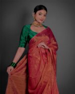 Close up view of a model showcasing Ombre Red Tissue Linen Saree , Suitable for social events By Mirra Clothing