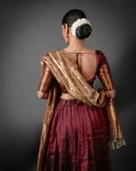 Back view of a model showcasing Coffee Brown Silk Half Saree Set with Tissue Silk Dupatta, Ideal for cultural festivals By Mirra Clothing