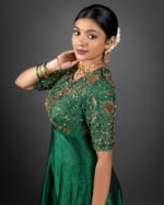 Green Silk Dress highlighted with Intricate Embroidery