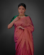 Close up view of a model showcasing Ombre Pink Tissue Linen Saree , elegant for grand occasions By Mirra Clothing