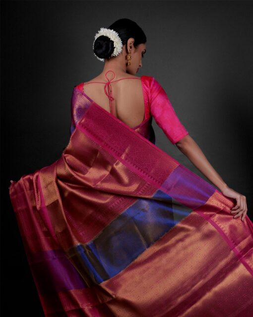 Back view of a model showcasing Purple Tissue Kora Silk Saree with contrast border, Joyful attire for festivities By Mirra Clothing