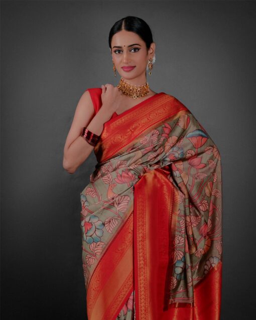 Side view of a model showcasing Green Banarasi Silk Saree Highlighted with Kalamkari Prints , Perfect for celebrating special occasions By Mirra Clothing