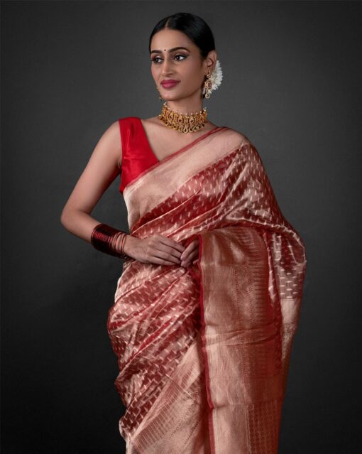 "Close-up of a luxurious red tissue saree showcasing Gold Buttis Saree By MirraClothing