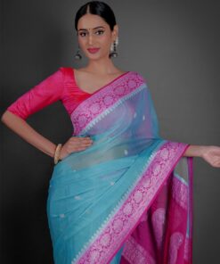 "A breezy mint Blue chiffon saree with a lightweight feel, ideal for a casual outing or daytime celebration."By Mirra Clothing