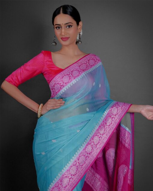 "A breezy mint Blue chiffon saree with a lightweight feel, ideal for a casual outing or daytime celebration."By Mirra Clothing