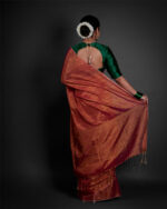 Back view of a model showcasing Ombre Red Tissue Linen Saree , Perfect For Festive Occasions By Mirra Clothing