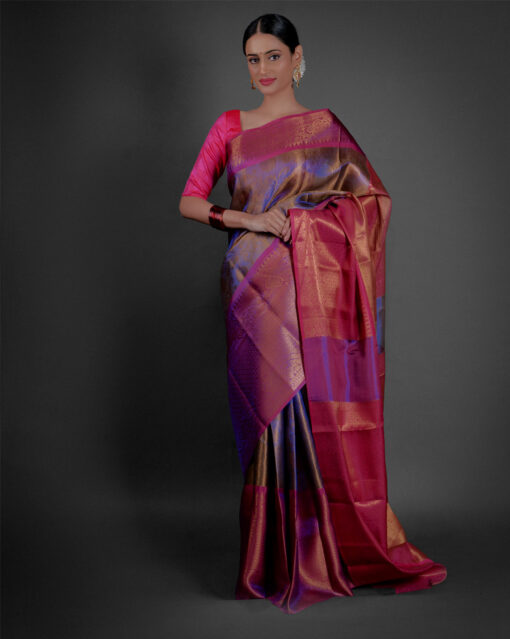 Side view of a model showcasing Purple Tissue Kora Silk Saree with contrast border, Great for special occasions By Mirra Clothing