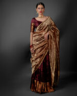 Front view of a model showcasing a Coffee Brown Silk Half Saree Set with Tissue Silk Dupatta, Designed for traditional festivals By Mirra Clothing