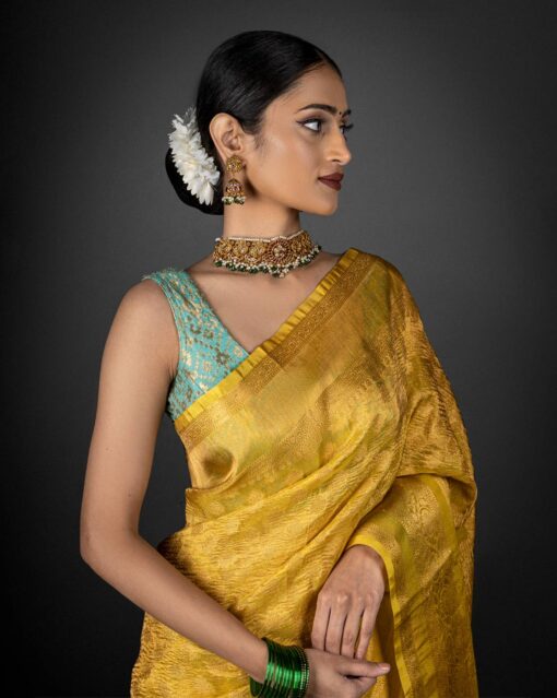 Yellow Crushed Tissue Silk Saree highlighted with Gold Zari Weaves by Mirra Clothing