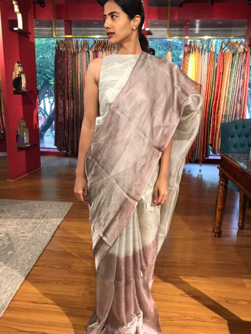 Front view of a model showcasing a Ombre wine Tissue Silk Saree , Ombre wine Tissue Silk Saree By Mirra Clothing