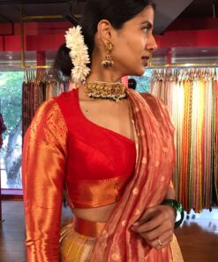 Side view of a model showcasing Yellow Semi Kanchi Silk Half Saree (Set of 3), Well-suited for Festive Gatherings By Mirra Clothing