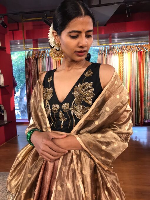 Close up view of a model showcasing Dusty Pink Half Saree Silk Lehenga Set, Well-suited for Traditional Events By Mirra Clothing