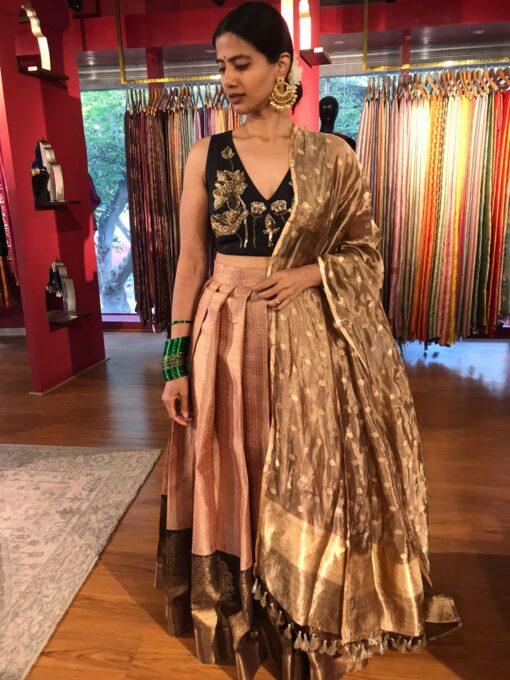 "Front view of a model showcasing a Dusty Pink Half Saree Silk Lehenga Set, Suitable for Joyful Occasion Outfit By Mirra Clothing