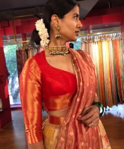 Side view of a model showcasing Yellow Semi Kanchi Silk Half Saree (Set of 2), Designed for festive wedding occasions By Mirra Clothing