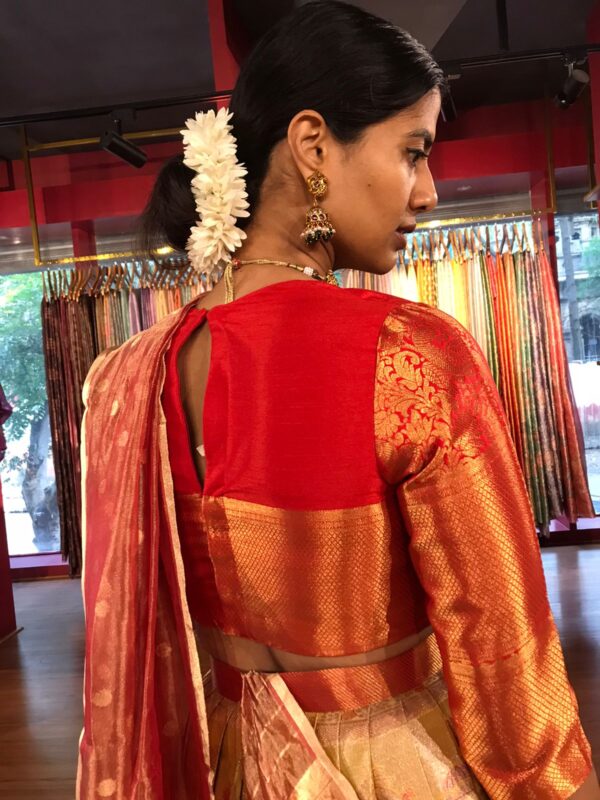 Back view of a model showcasing Yellow Semi Kanchi Silk Half Saree (Set of 2), Gorgeous lehenga for pre-wedding festivities By Mirra Clothing