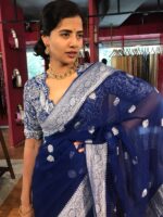 Full view of a model showcasing Blue Khaddi Banarasi Chiffon Silk Saree with Kadwa Zari Motifs, Perfect for Festive Wear By Mirra Clothing