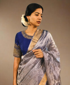 Full view of a model showcasing Blue Tissue Silk Saree, Perfect for celebrating special occasions By Mirra Clothing