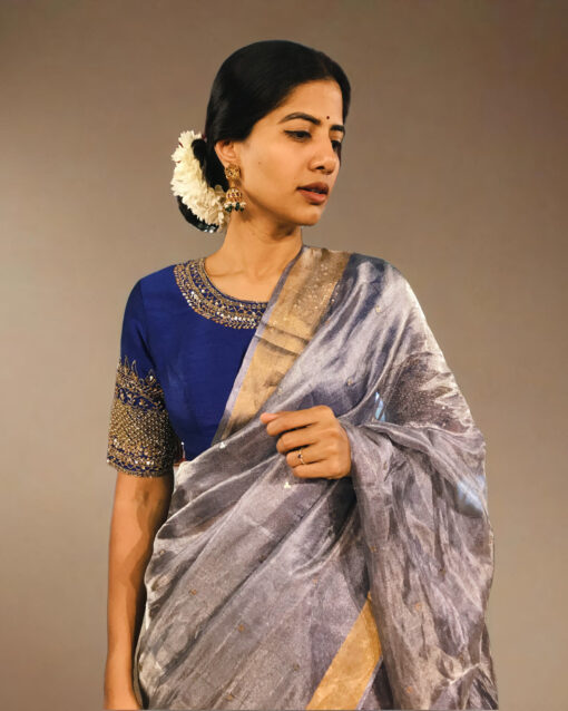 Full view of a model showcasing Blue Tissue Silk Saree, Perfect for celebrating special occasions By Mirra Clothing